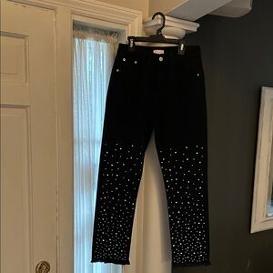 Pink Lily size 26 black jeans with crystals and fringed hem. New without tags